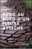 Assis au bord d'un fleuve asséché